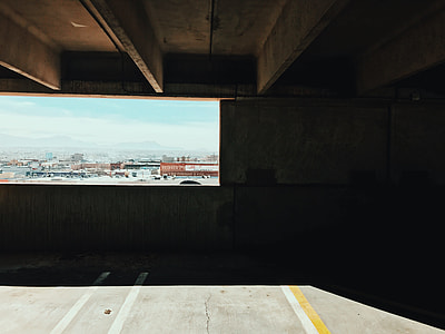 empty parking area inside building at daytime thumbnail