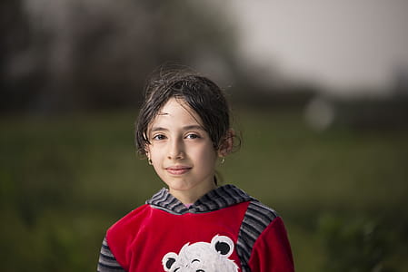 Girl Wearing Red and Black Hoodie thumbnail