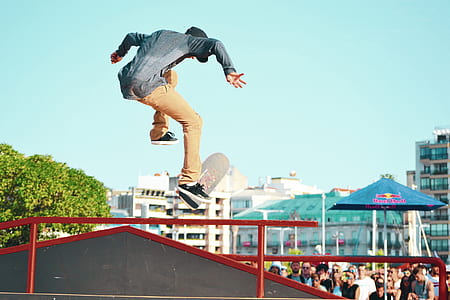 person performing skateboard trick on fence thumbnail
