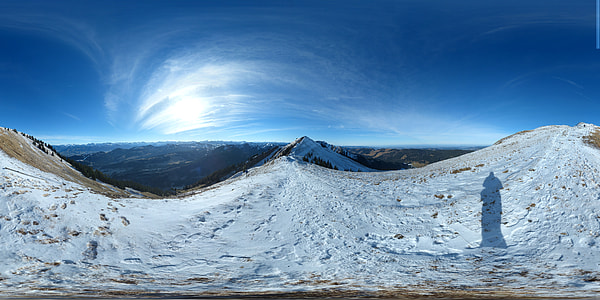 snow covered hills during day thumbnail