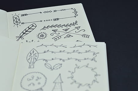 Selective Focus Photo of White Coloring Book Page thumbnail