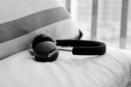 wireless headphones on bed thumbnail