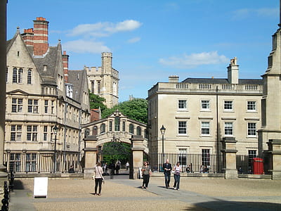 people walking near building during daytime thumbnail