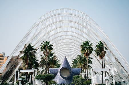 gray concrete structure surrounded by trees thumbnail
