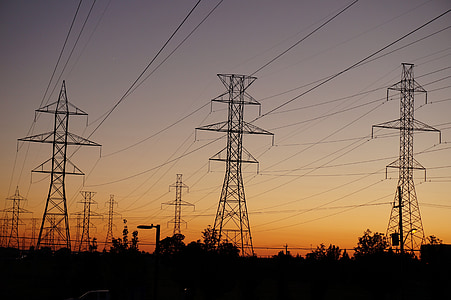 silhouette of cellular towers during sunset thumbnail