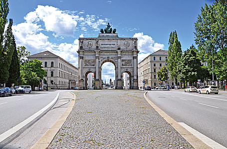 stone gate during daytime thumbnail