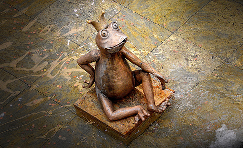 top view photography of brown frog ceramic figurine thumbnail