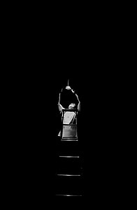 grayscale of photo of man holding bulb thumbnail