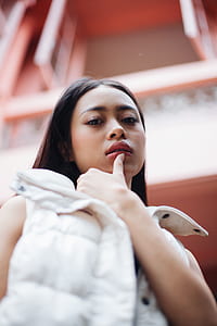 woman wearing white bubble vest thumbnail