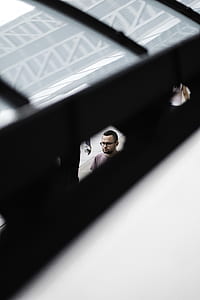 man in brown shirt shown on hole thumbnail
