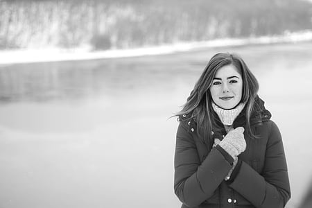 grayscale photography of woman wearing jacket thumbnail
