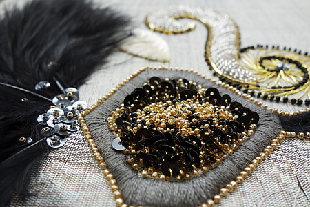 beaded gold-colored accessory thumbnail
