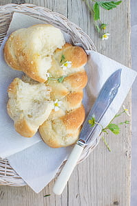 baked bread on white wicker tray thumbnail