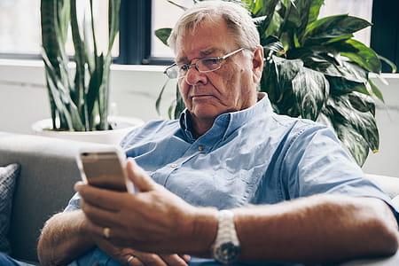 Senior Using Cell Phone Photo thumbnail