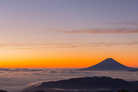 mountain above clouds during sunset thumbnail