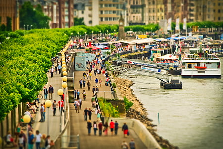 people on standing beside body of water thumbnail