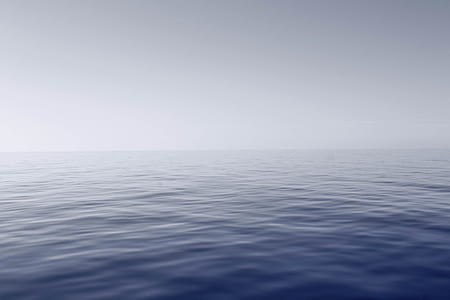 Blue Body of Water With Fog thumbnail