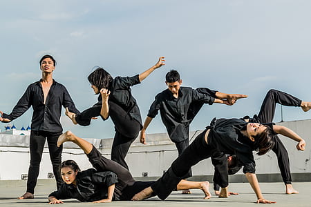 Persons in Black Shirt and Pants thumbnail