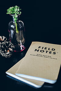 Field Notes book near the glass bottle thumbnail