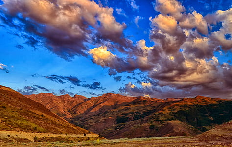 mountain under cumulus clouds thumbnail