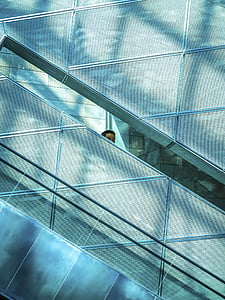 man standing beside the wall of the building thumbnail