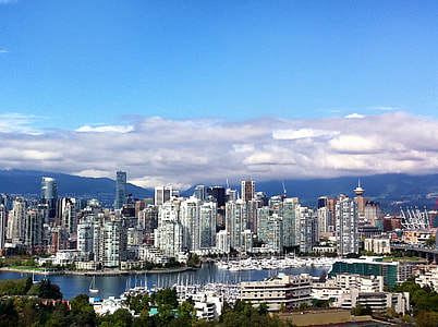 high angle photography of white high-rise buildings near ocean water during daytime thumbnail