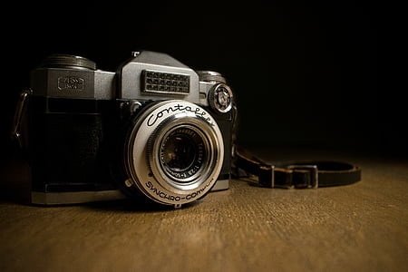 silver and black SLR camera thumbnail