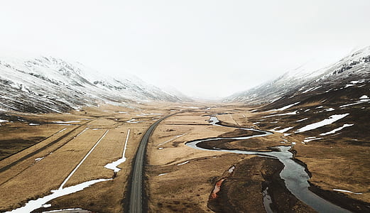concrete road between mountain thumbnail