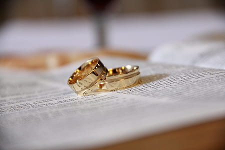 Macro Shot Photography of Two Gold-colored Band Rings thumbnail