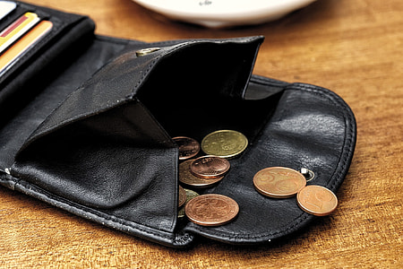 black leather wallet with coins and cards thumbnail