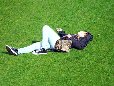 person lying on the grass thumbnail