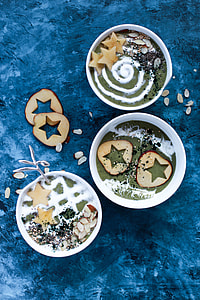 three round white ceramic bowls filled with food thumbnail