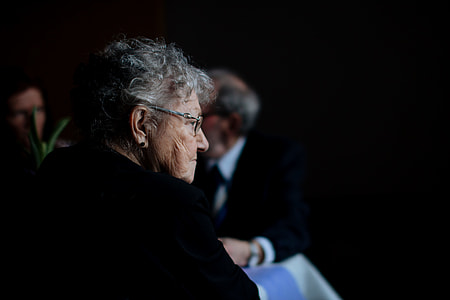 woman wearing eyeglasses beside two man thumbnail