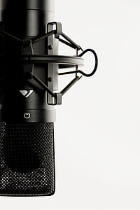 black condenser microphone against white background thumbnail