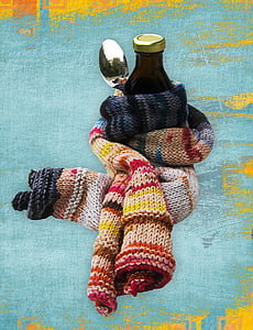 amber bottle covered by crochet scarf thumbnail