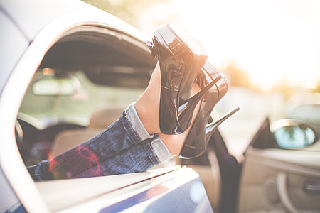 Sexy Woman Legs on High Heels Out of Car Windows thumbnail