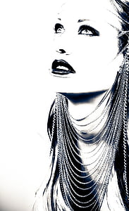 grayscale photography of woman wearing multi-layered necklace thumbnail