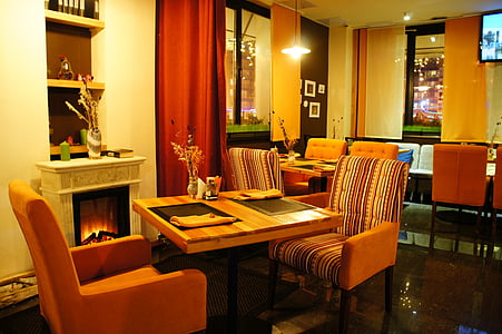 brown wooden dining table with chair thumbnail