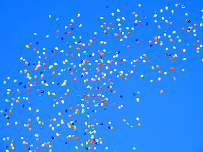 assorted balloons under blue sky thumbnail