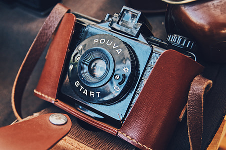 blue and brown Pouva Start camera thumbnail
