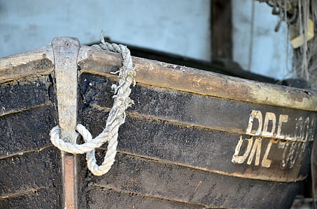 closeup photo of brown wooden boat thumbnail