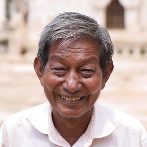 closeup photo of a man smiling thumbnail