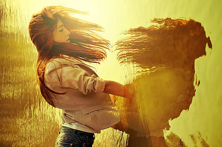 woman watching reflection on body of water thumbnail