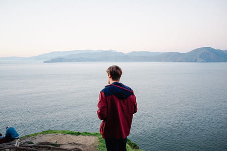 man in red and blue jacket thumbnail