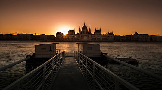 silhouette of building in golden hour background thumbnail