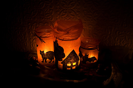 three amber-and-black Halloween themed mason jars thumbnail