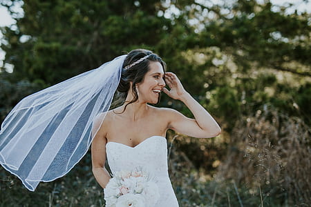woman wearing white wedding veil thumbnail