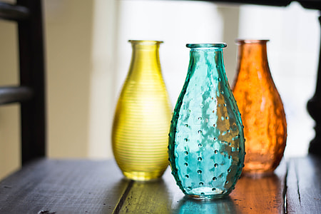 Closeup shot of glass vases on a house table thumbnail