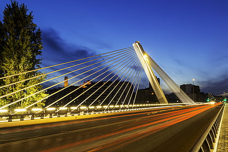 time lapse photography of lighted light on bridge thumbnail