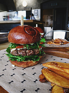 Beef burger with homemade baked potatoes thumbnail